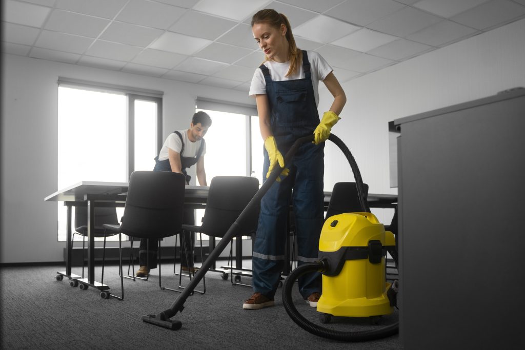 full shot people cleaning office